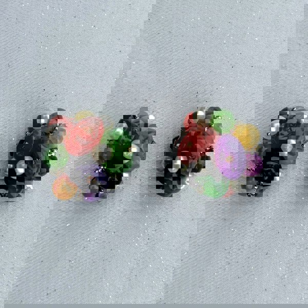 Colourful clip-on earrings, cluster bead design, orange green purple and pearl beads, gold-tone accents, bold statement jewellery, vintage-inspired accessory
