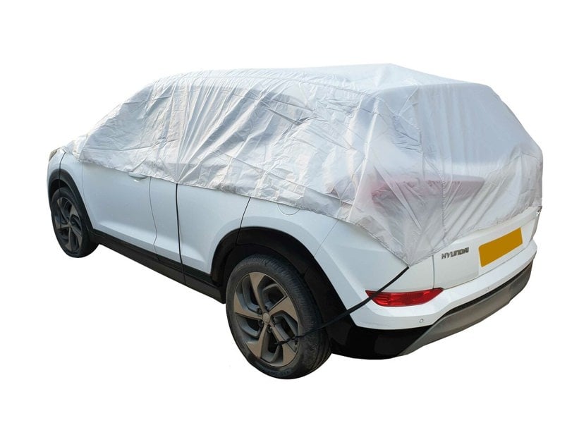 The Nylon Car Top Cover Extra Large by OLPRO on a white Hyundai family car on a white background.