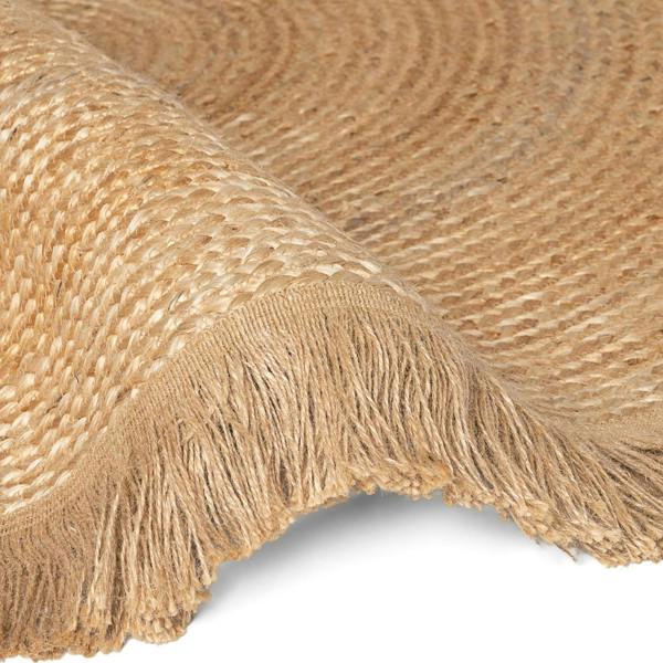 Close-up of a textured beige fabric with fringes on a white background