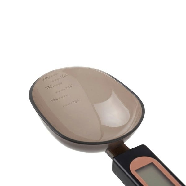 Close-up of the spoon scale, showcasing its sleek design and digital display for easy reading.
