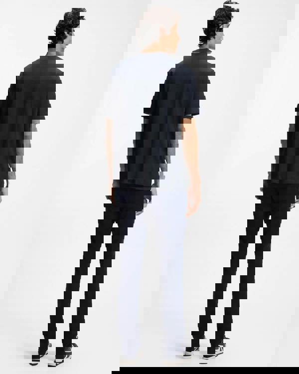 Model wearing BOSS Orange Te Board Mens T-Shirt in Dark Blue 404 - Back