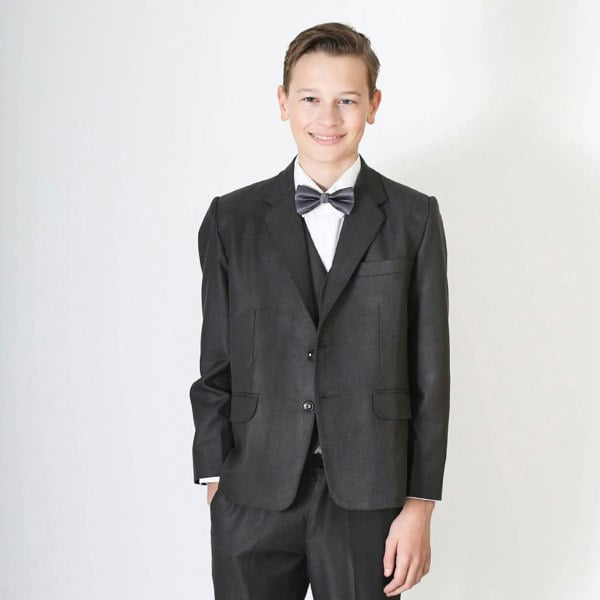 Young boy wearing suit