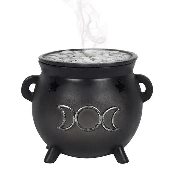 Black cauldron incense cone holder with moon emblem, star accents, three legs
