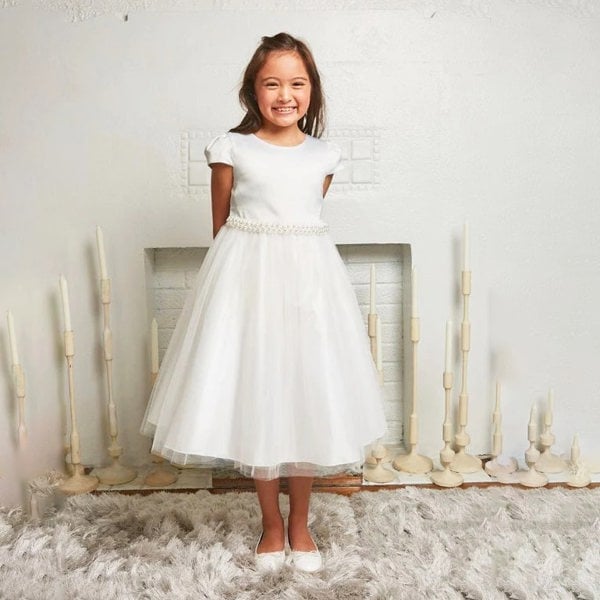 Girl in white satin party dress