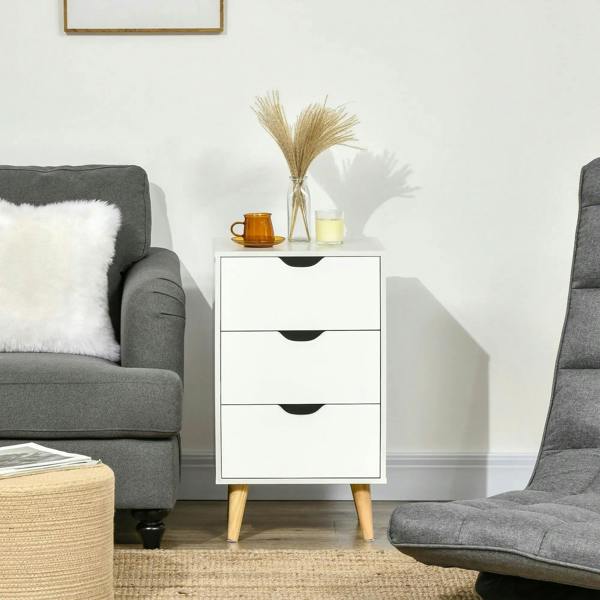 White bedside cabinet with three drawers and light pine tapered legs