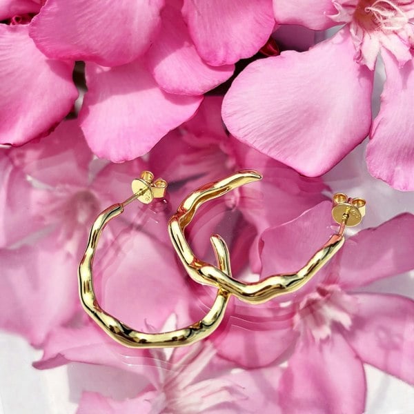 Liquid gold hoops by LENAE London, contemporary sculptural earrings.