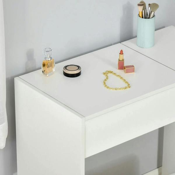 White vanity table with flat tabletop and open storage area