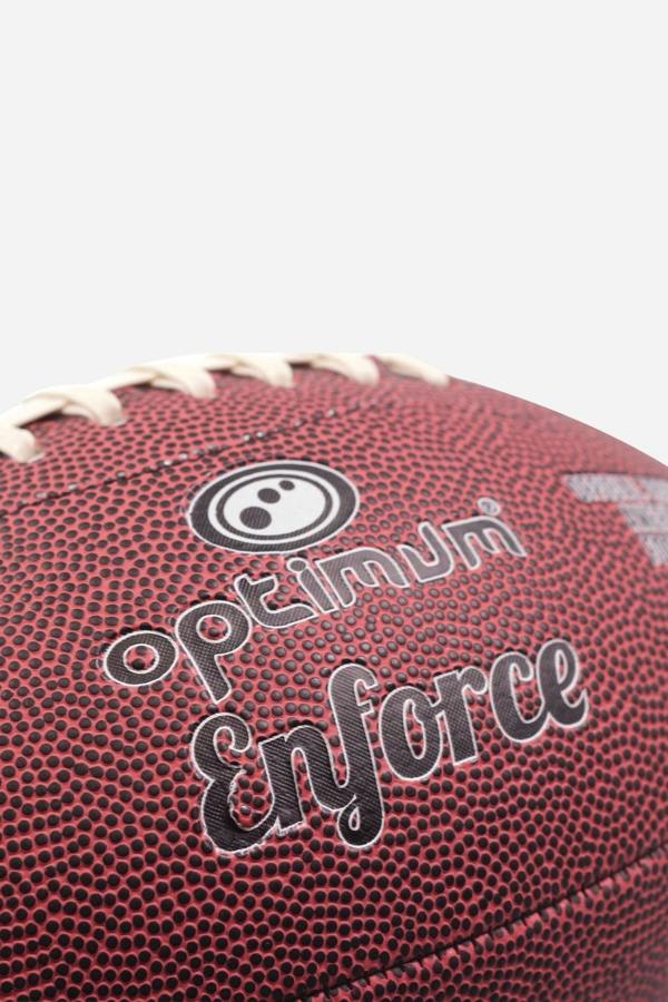 Close-up of maroon Optimum Enforce American football showing logo and pebbled grain - Optimum