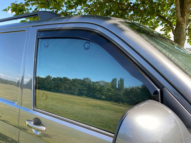 An image from the front right and outside of the Internal Blackout Insulated Blind Set for VW T5/T6 Campervans from OLPRO