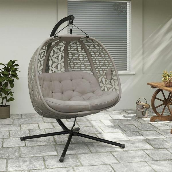 Outdoor hanging chair with round patterned canopy and tufted padded seat cushion