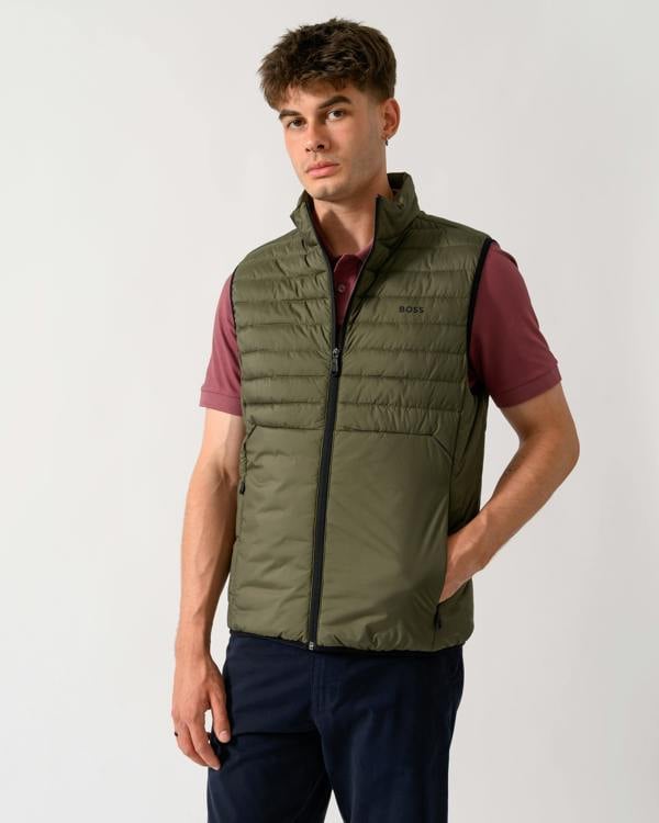 model wearing a BOSS Green Urbanex Mens Gilet in Open Green 398