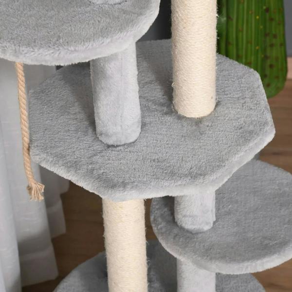 Grey plush multi-level platforms with cream scratching posts and hanging rope
