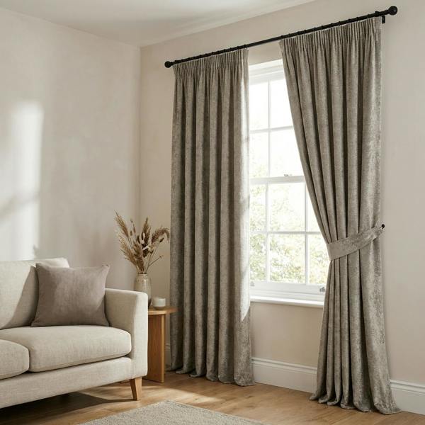Tuvalu made-to-measure curtains in Chrome, styled in a living room