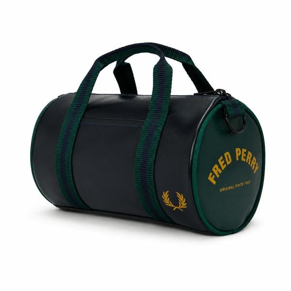 Fred Perry Classic Mini Barrel Bag in navy and dark green, with gold logo and striped handles.