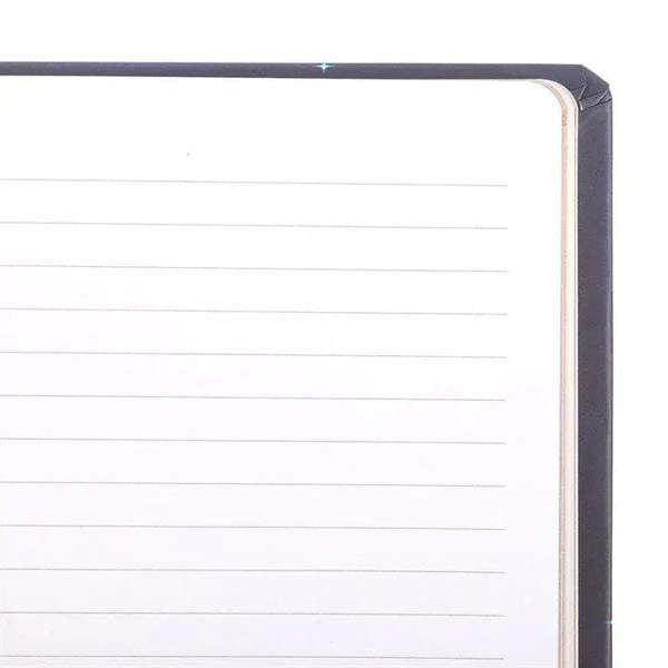 A5 dream journal open to lined pages with navy cover and blank writing lines