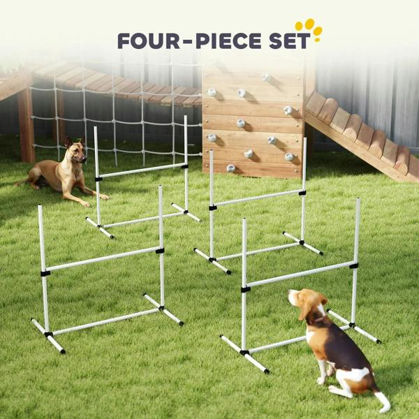 Four-piece white dog agility training obstacle set with hurdle frames on grass