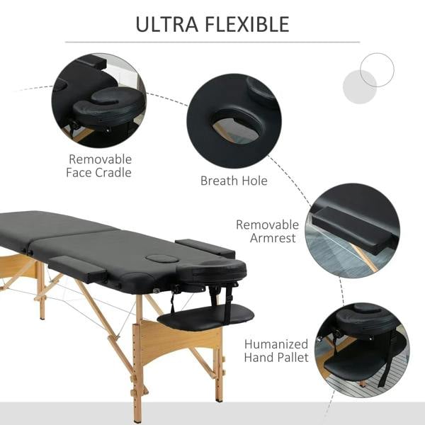 Black folding massage table with removable face cradle, breath hole, and padded armrest