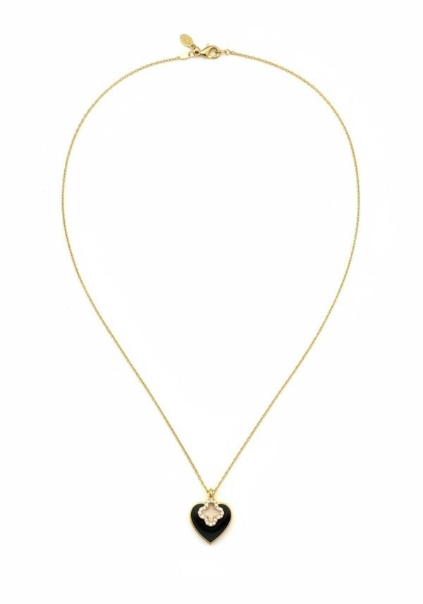 Gold necklace with a black heart-shaped pendant on a white background 