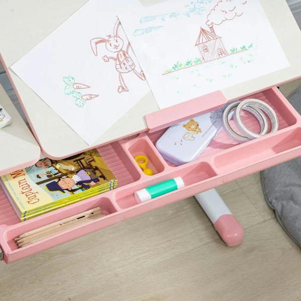 Pink desk storage tray with compartments holding drawing paper and stationery