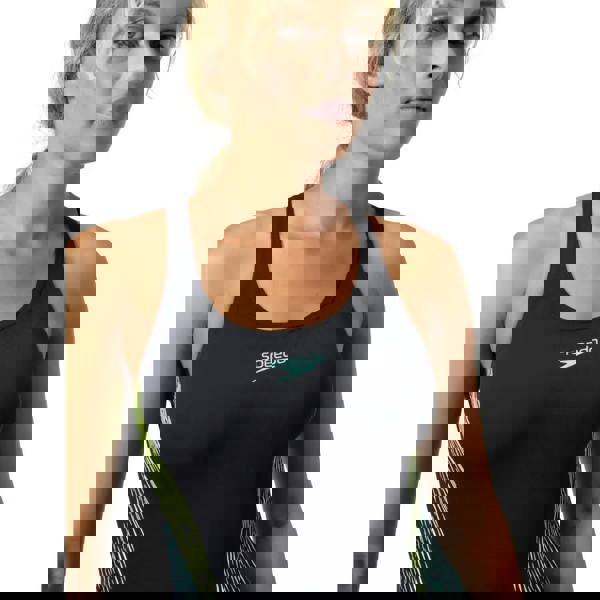 Black Speedo placement muscleback swimsuit with neon green blue accents