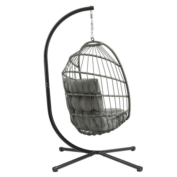 Grey rattan hanging egg chair with plush cushions, suspended from a sleek black metal frame, perfect for indoor or outdoor relaxation