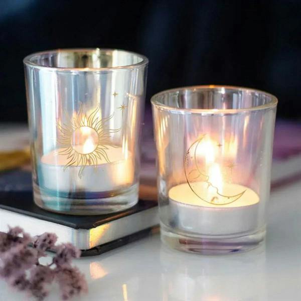 Iridescent glass votive holders with gold sun and moon designs