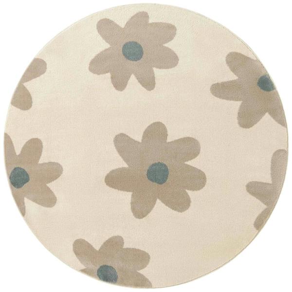 Round beige rug with brown floral patterns on a white background