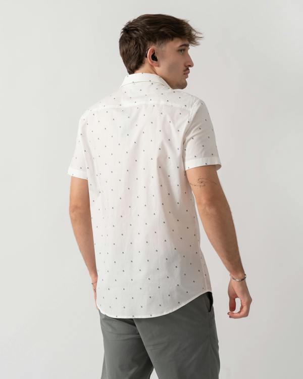 back shot of a model wearing an Armani Exchange Mens Short Sleeve Shirt with Geometric Pattern in Off White F0198