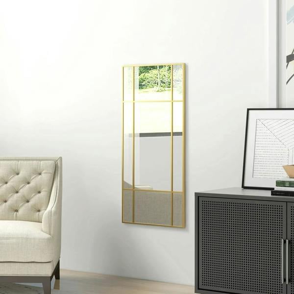 Gold-tone grid wall mirror with rectangular frame and reflective glass panels.