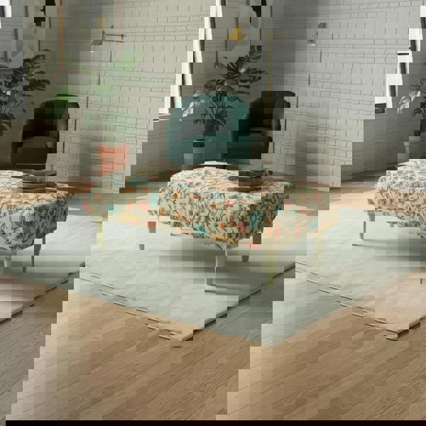 Long upholstered pouffe ideal for lounge or bedroom seating