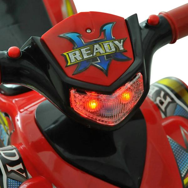 Red quad bike dashboard with READY emblem and amber light on front
