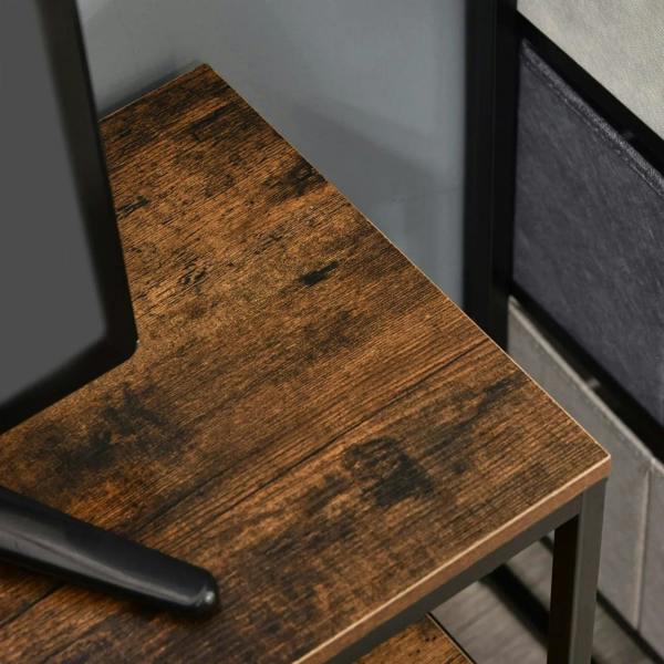Rustic brown tabletop corner and black metal support leg of a TV stand cabinet