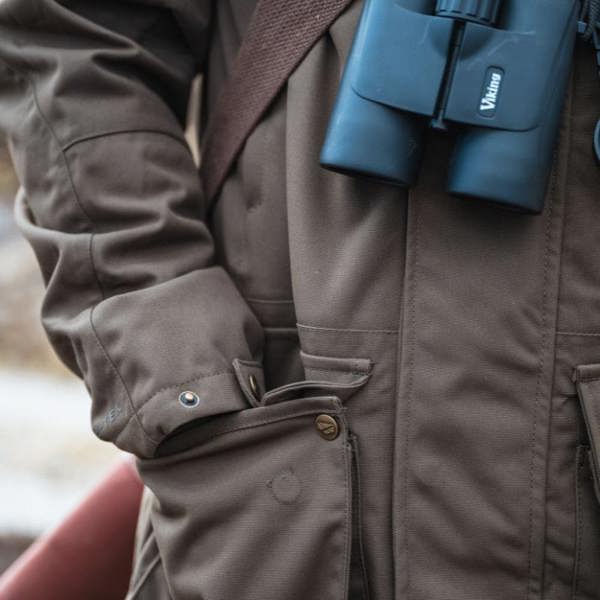 Close up of the Hoggs of Fife Ballater waterproof field jacket out on the field