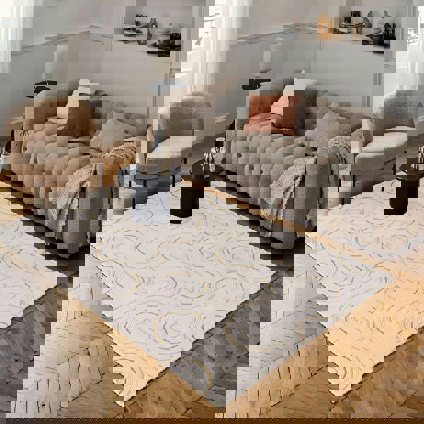 Living Room rug, gold-cream colours, geometric, practicality in mind, the rug is anti-allergic.