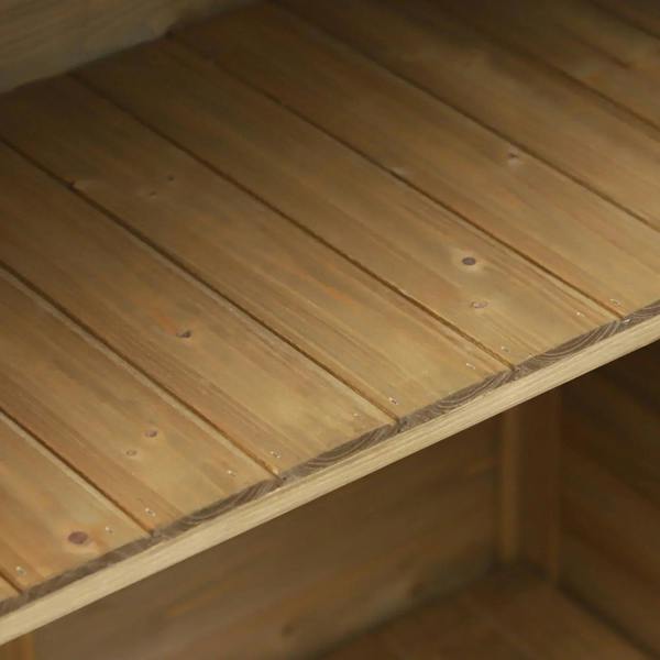 Interior wooden floor and side panels of a storage shed cabinet