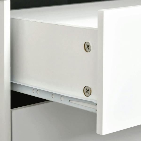 White cabinet drawer interior with metal rail and mounting screws