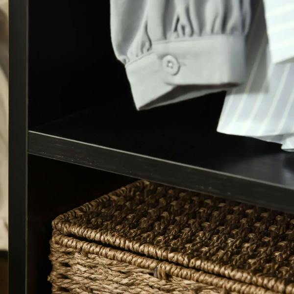 Black open wardrobe shelf with woven storage basket in lower compartment
