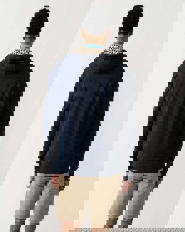 rear view of a model wearing an Aquascutum Mens Full Zip Badge Hoodie in Navy