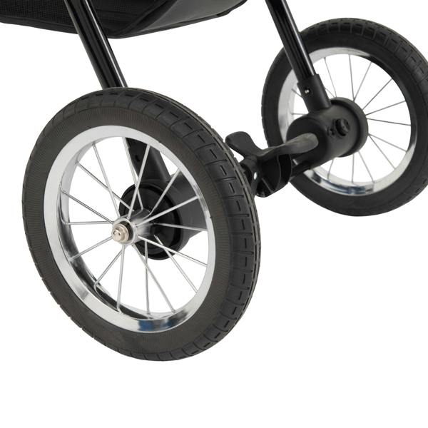 Black pet jogger featuring durable rubber wheels with silver rims, designed for smooth rides and easy maneuverability on various terrains