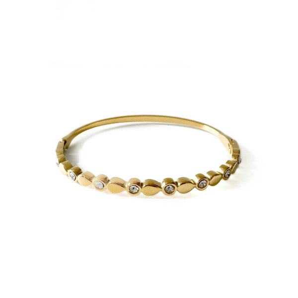 Gold bracelet with small diamonds on a white background