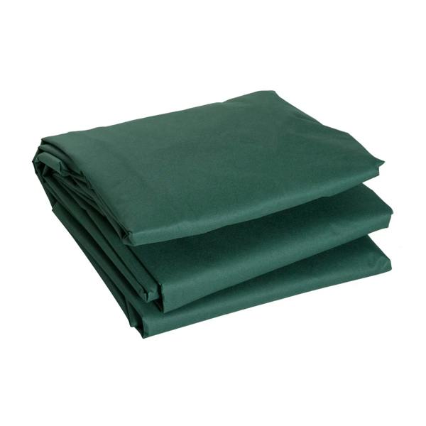 Green patio furniture cover folded flat in stacked layers