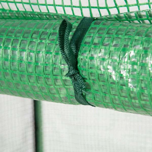 Rolled edge of green PE greenhouse cover with reinforced strap tie