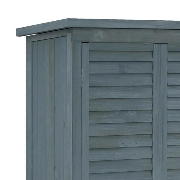 Grey fir wood garden shed front close-up with roof overhang and double door panels.