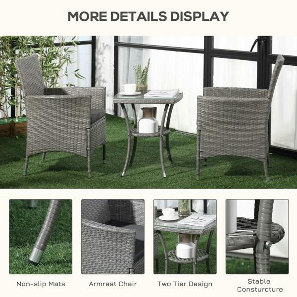 Grey rattan bistro set with two chairs and a two-tier table on grass