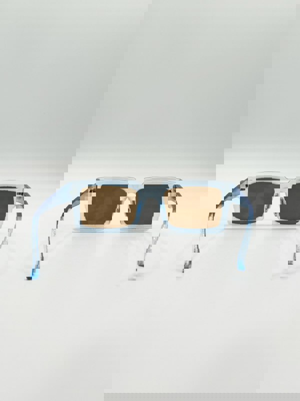 SVNX Square Frame Sunglasses in Translucent Blue with Brown Lenses