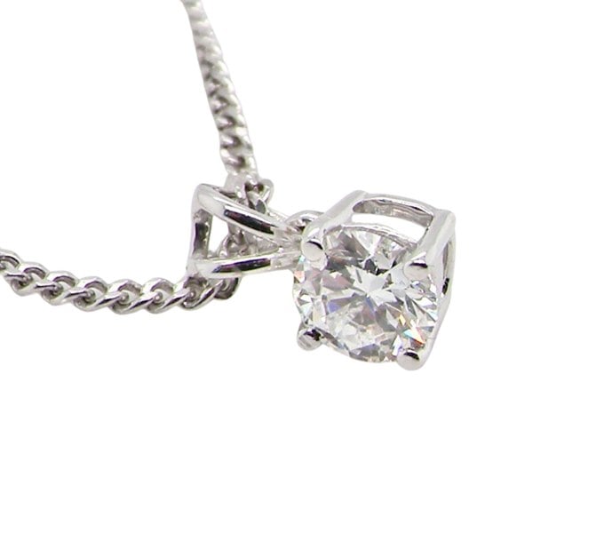 Vintage Tom A fine half carat diamond pendant