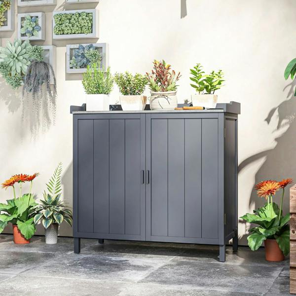 Grey outdoor storage cabinet with two-door front and flat top