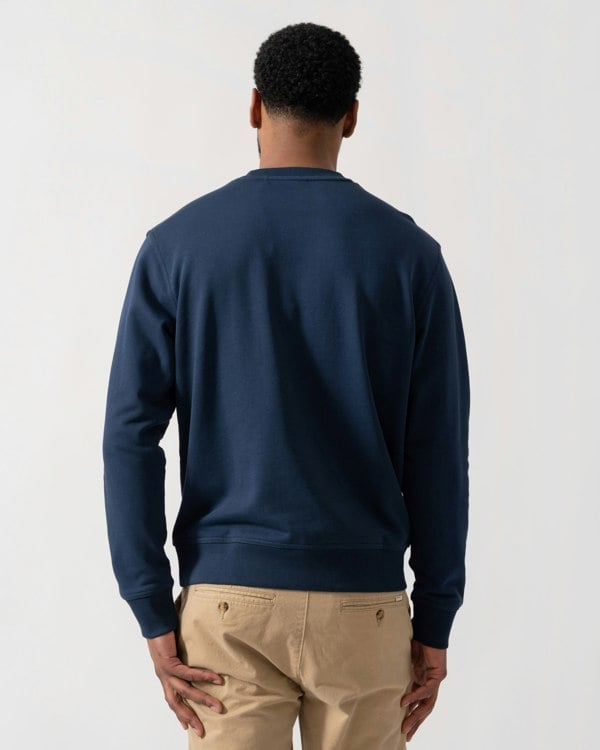 Model wearing BOSS Orange WeSmall Crew Sweatshirt in Open Blue 464 - back