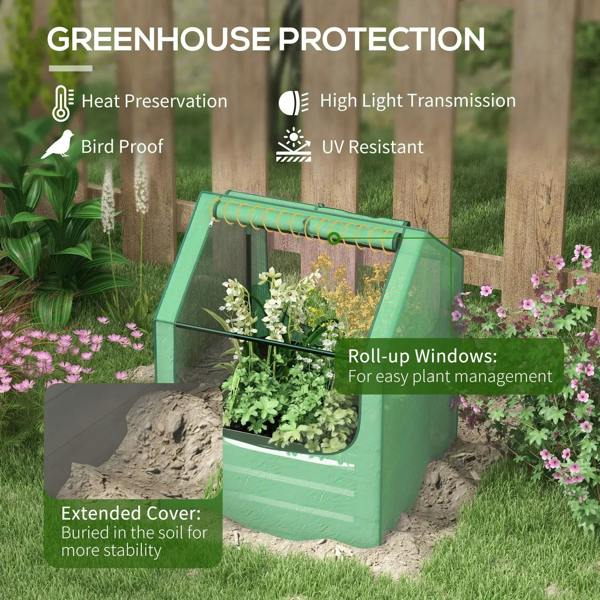 Green greenhouse cover over planter bed in garden with flowers around