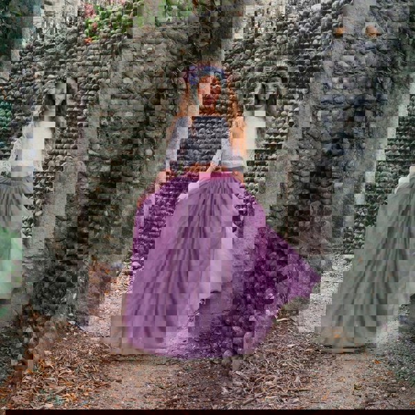 Girl wearing mauve dress